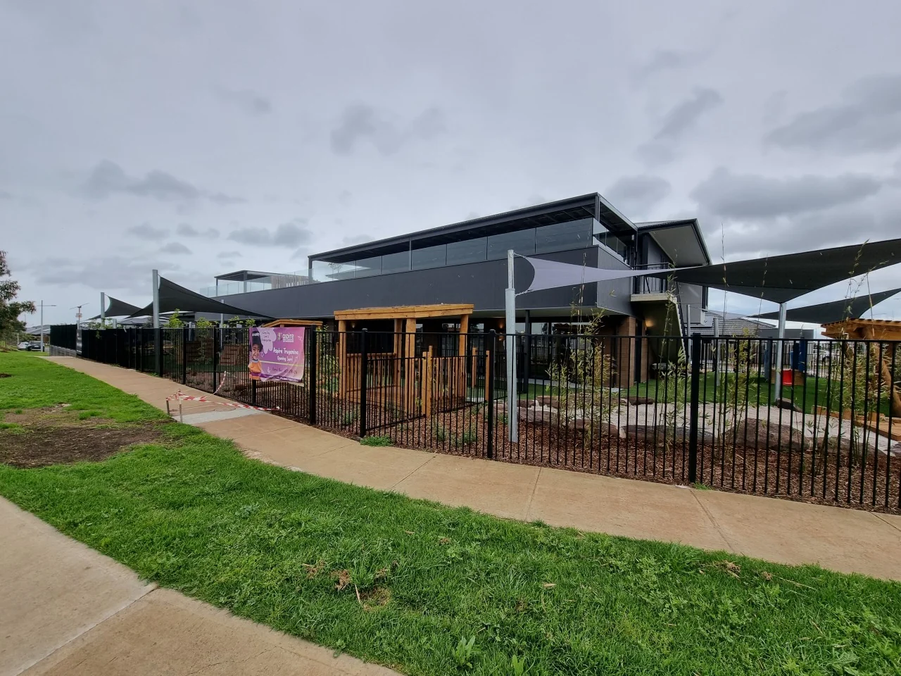 Wide view of the Derrimut childcare centre and tubular steel perimeter fencing