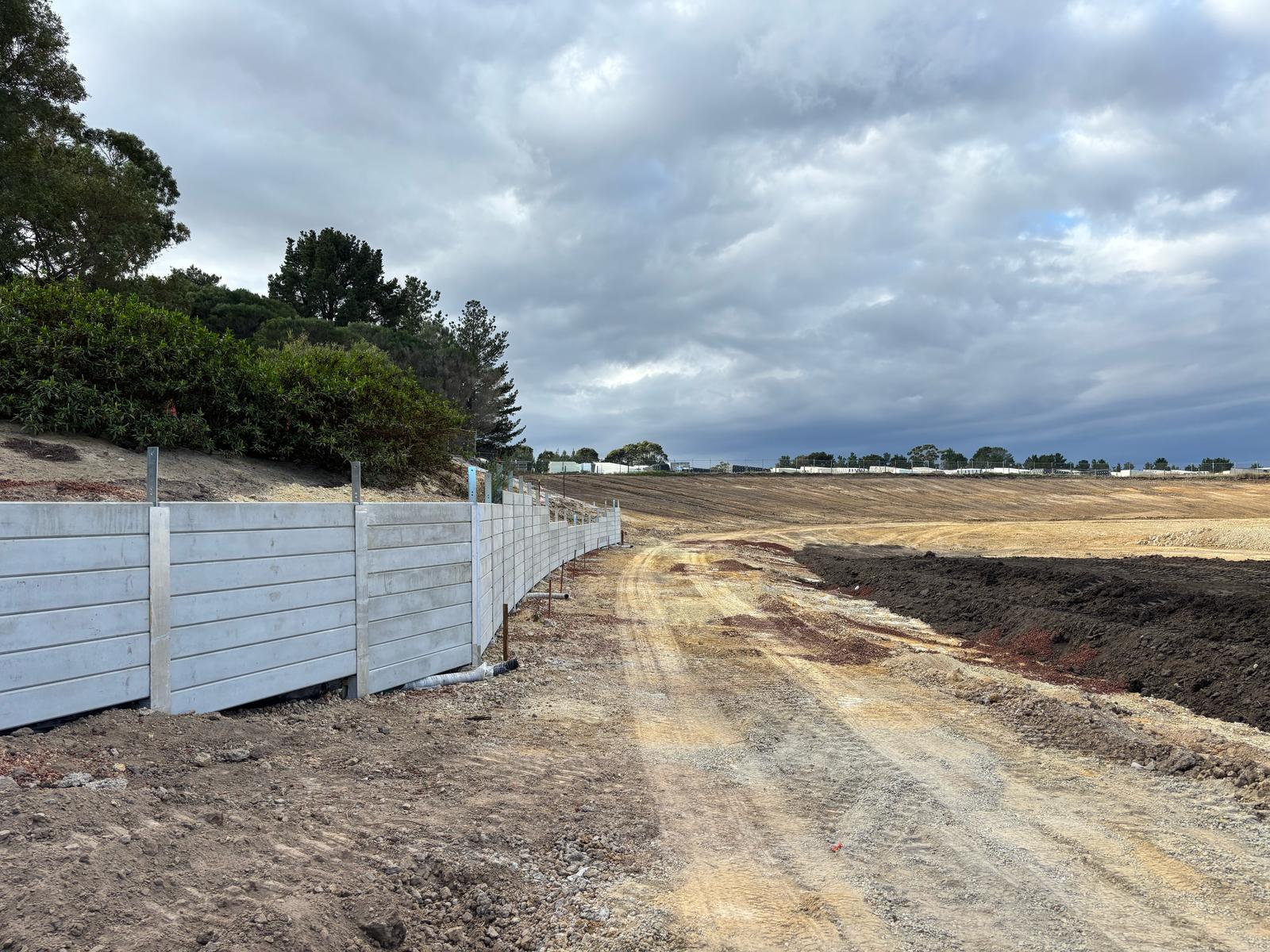 Venald curved retaining wall construction at Devon Meadows Wetlands