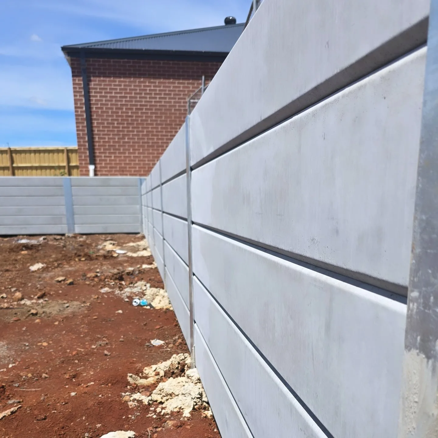 Close view of concrete sleepers and steel posts at Rockbank Childcare Centre